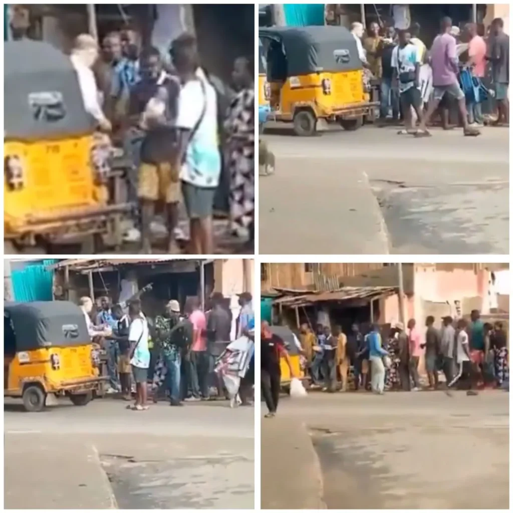 Economic hardship: Trending video of Nigerians filing out to receive loaves of bread and bible from a missionary in Lagos