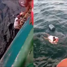 Moment man lost in middle of ocean for over 4 hours is rescued after his boat capsized in Delta state (video)