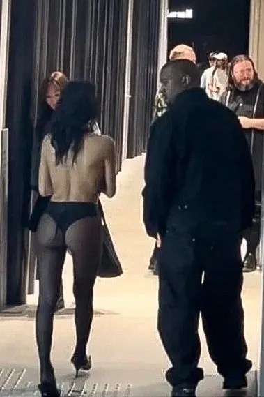 Onlookers stare at Kanye's West's wife as she dons revealing outfit on the streets of Tokyo (photos)