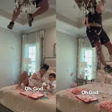 Dad's Hilarious Ceiling Mishap Caught on Video by Wife and Son