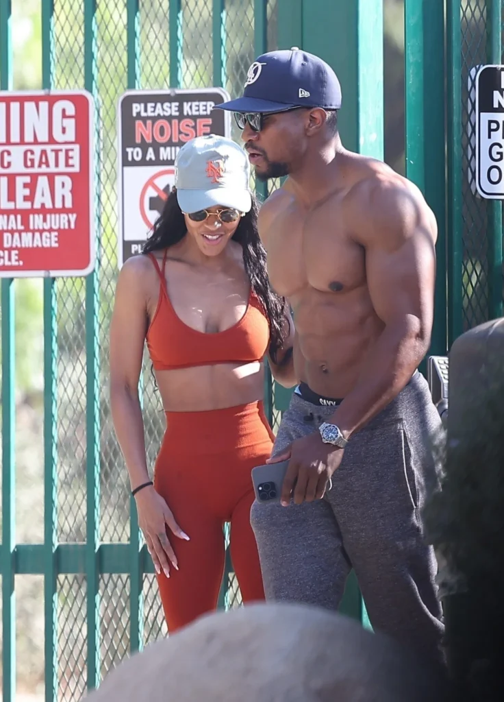 Jonathan Majors Flaunts Impressive Physique on Morning Walk with Fiancée Meagan Good