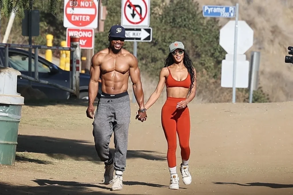 Jonathan Majors Flaunts Impressive Physique on Morning Walk with Fiancée Meagan Good