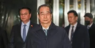 South Korean Lawmakers Take Action: Han Duck-Soo's Impeachment Unveiled