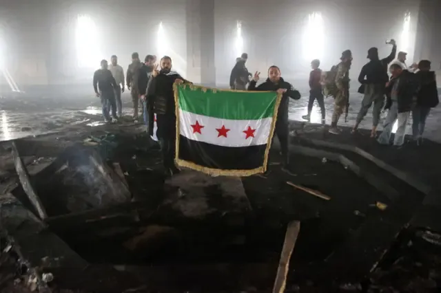 Syrian Rebels Torch Tomb of Hafez al-Assad: Impact and Reactions